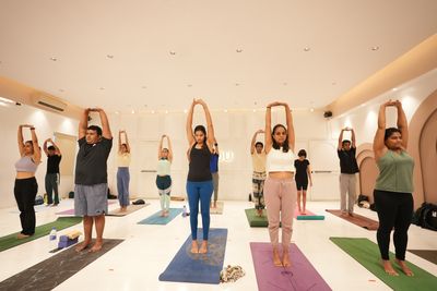 Group Yoga class led by Prajakta Gogate in studio